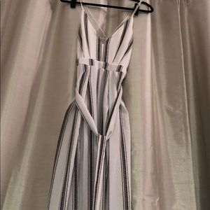 Pin strip open slit jumpsuit